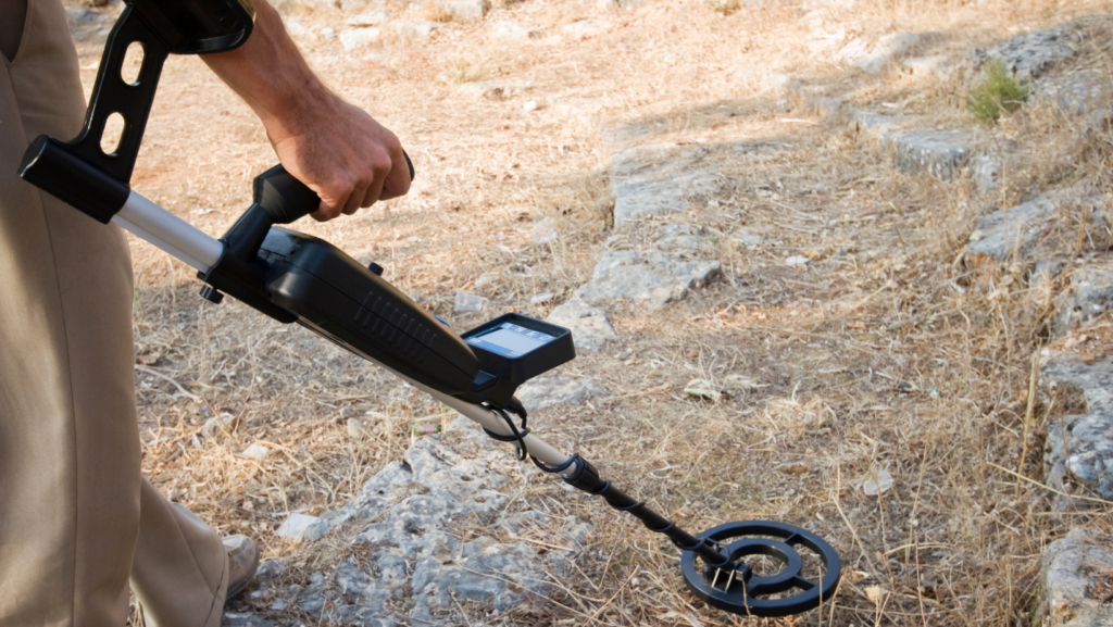 Man holding a metal detector